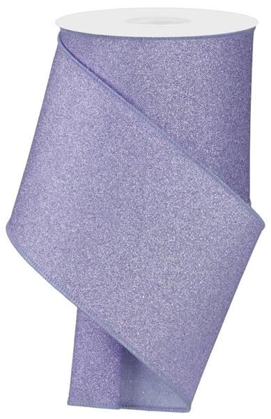 a roll of purple glitter ribbon on a white background