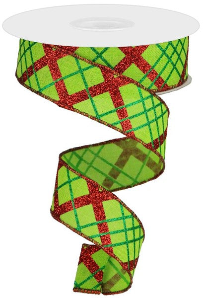 a roll of green and red plaid ribbon