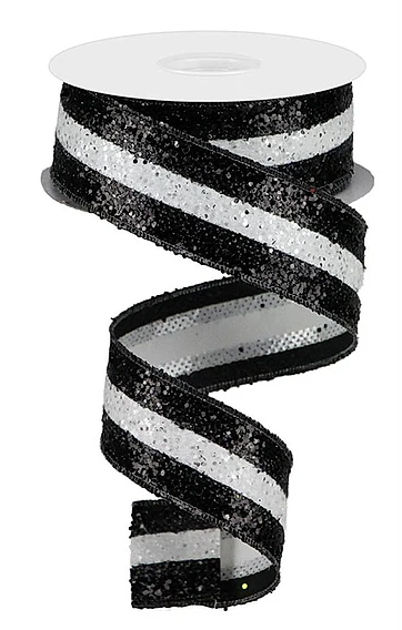 A spiral-shaped black and white ribbon with a metallic, sequined texture.