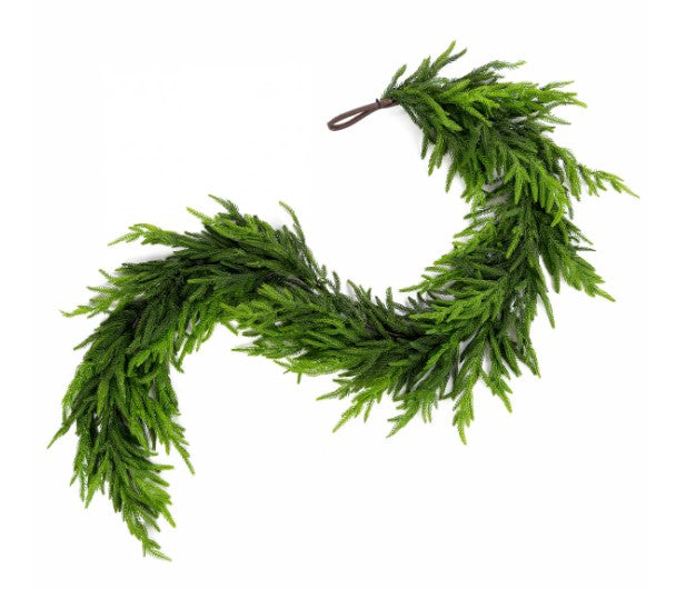 A wreath made of green pine needles or branches, creating a natural and festive appearance.