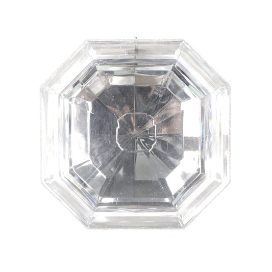 a close up of a diamond on a white background