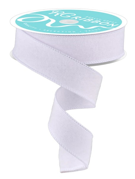 A roll of white ribbon with a turquoise label.
