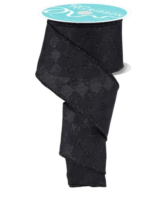 a black checkered pattern ribbon with a turquoise label.