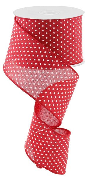 a roll of red and white polka dot ribbon