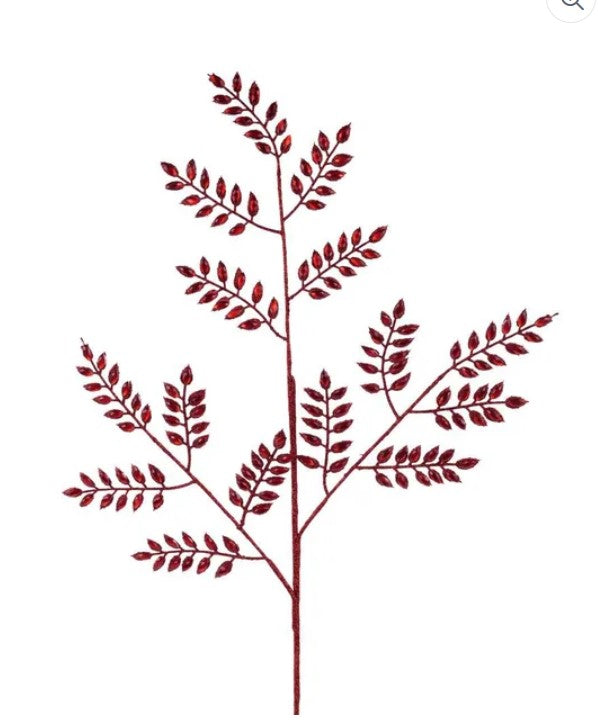 a red branch with numerous small leaves, creating a striking visual effect.