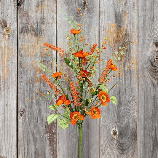 A bouquet of vibrant orange flowers and greenery is displayed against a weathered wooden background.