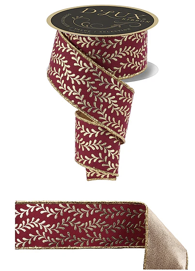 a decorative red and gold ribbon with a leaf pattern.