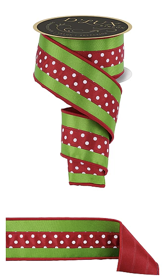 a green and red polka dot ribbon with a black and gold label.