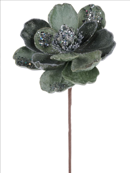 A single, intricately designed green flower with sparkling elements, such as glitter or sequins, attached to it.