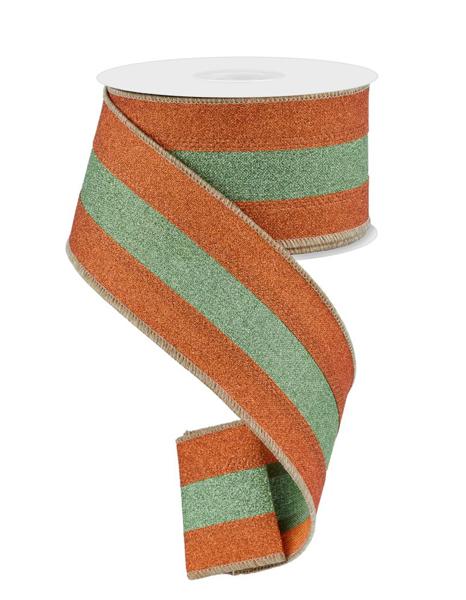 a roll of orange and green striped ribbon