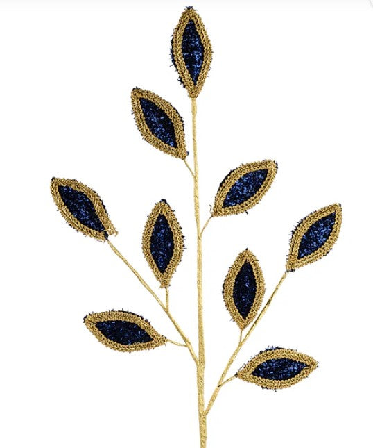 A gold stem with blue and gold leaf-shaped ornaments attached to it.