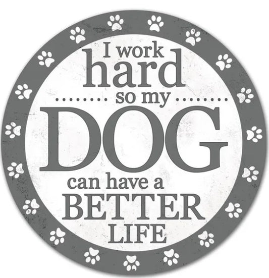a circular design with a central message that reads "I work hard so my dog can have a better life". The design is surrounded by paw prints, creating a playful and whimsical atmosphere.