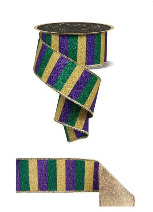a ribbon with a striped pattern in shades of green, purple, and gold.