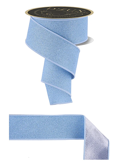 a blue ribbon with a gold label, and a smaller piece of the same ribbon.