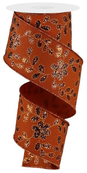 a brown and orange floral patterned ribbon.