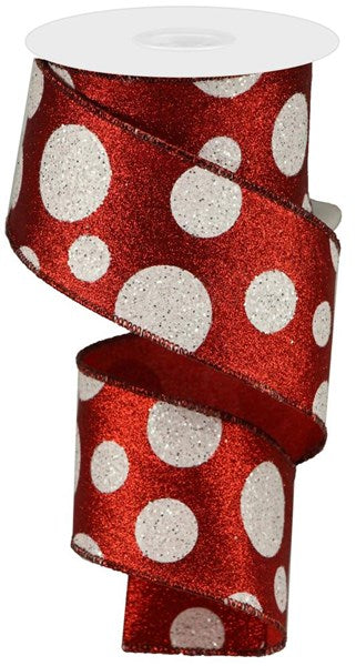 a roll of red and white polka dot ribbon