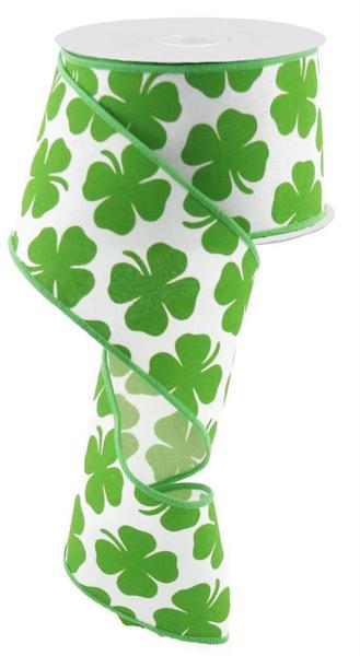 a green and white ribbon with shamrocks on it