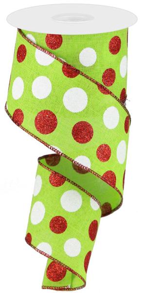 a roll of green and white polka dot ribbon