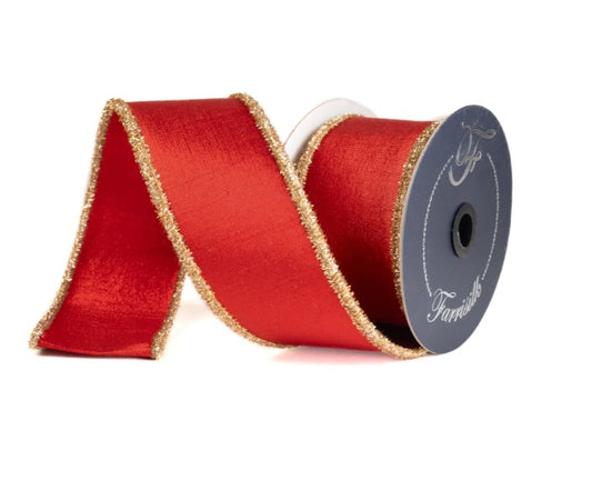 A roll of red and gold glittery ribbon with a silver tag that says "Families".