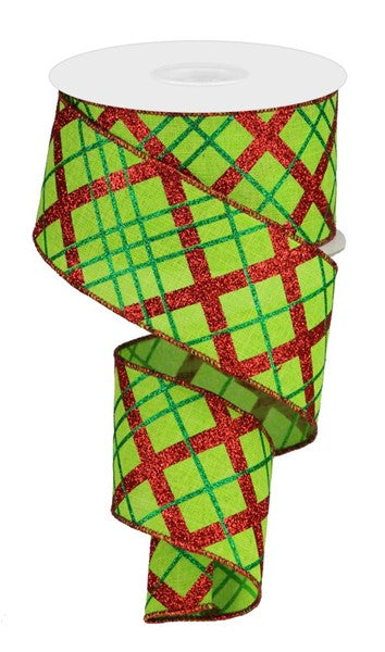 a roll of green and red plaid ribbon