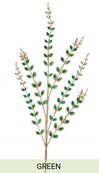 A branch with green leaves and small gold-colored stones or jewels attached to it.