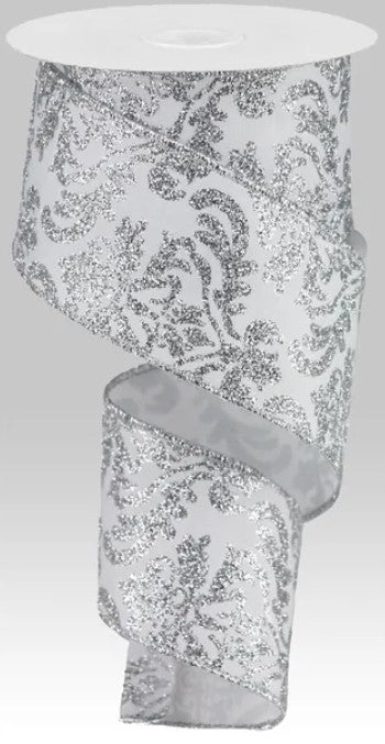 a silver and white floral patterned ribbon.