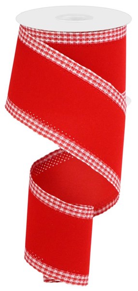 a roll of red ribbon with a white checkered pattern