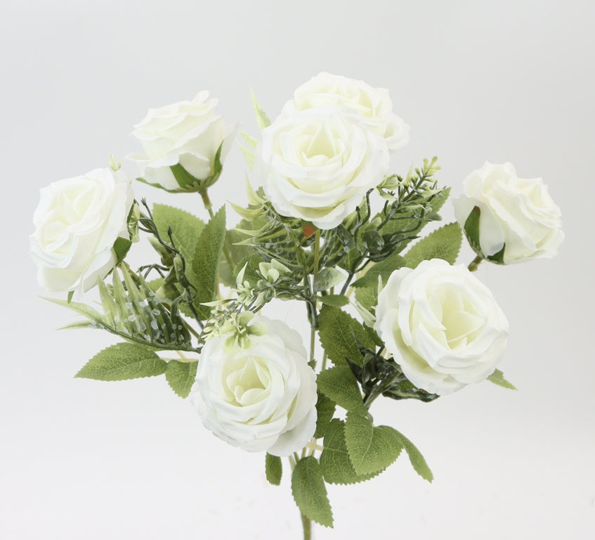 A bouquet of white roses with green leaves against a white background.