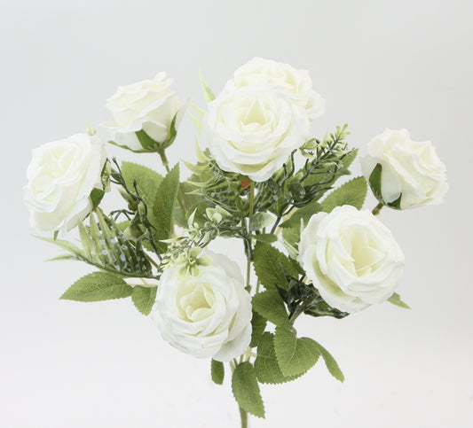 A bouquet of white roses with green leaves against a white background.