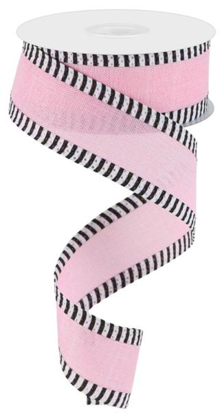 a pink ribbon with black and white stripes