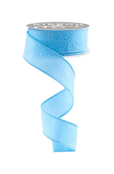 a roll of light blue satin ribbon on a white background