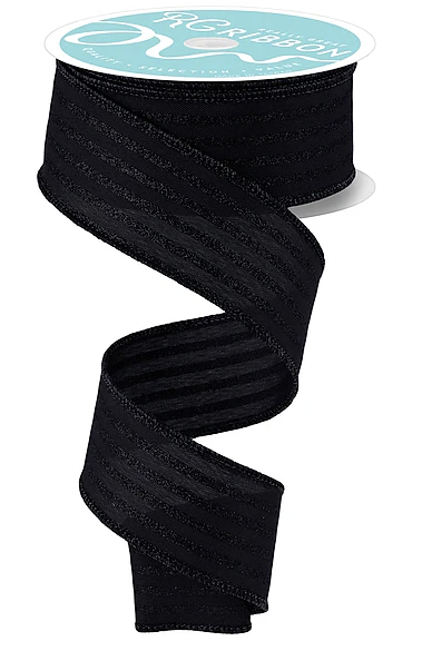 a black ribbon with a spiral pattern, and it is attached to a white label.