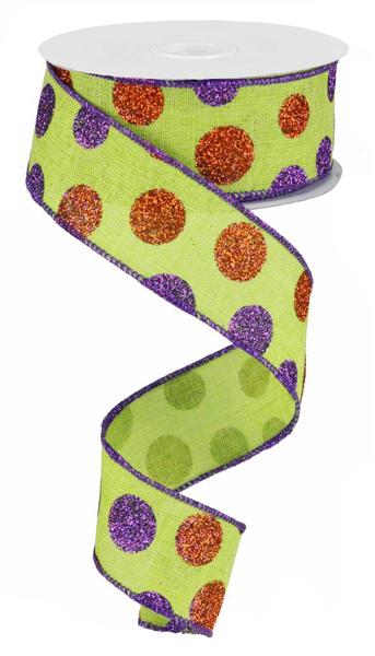 a roll of green and orange polka dot ribbon