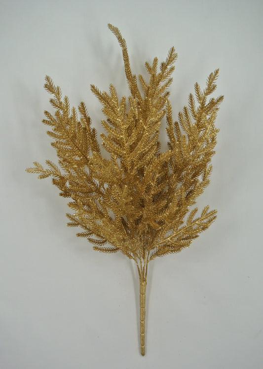 A golden artificial plant or decoration with multiple branches and leaves, creating a visually appealing and intricate design.