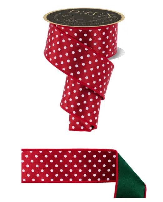 a red ribbon with white polka dots, and a green ribbon with red polka dots.