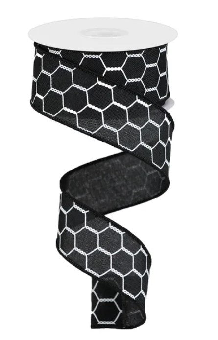 A black and white hexagonal pattern ribbon is shown, with a white spool at the top.
