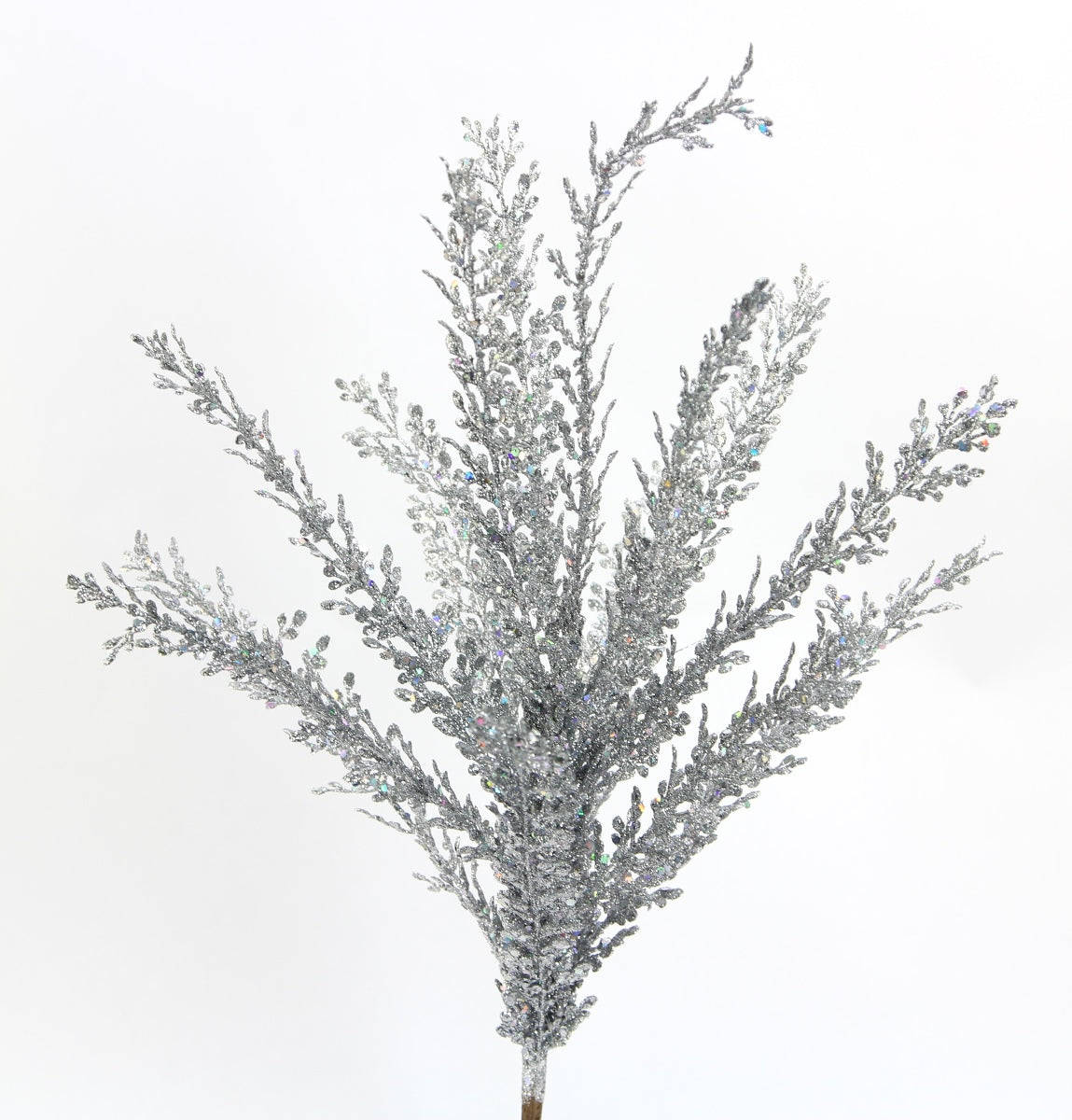 A silver-colored artificial tree branch with numerous small leaves and branches, creating a sparkling effect.