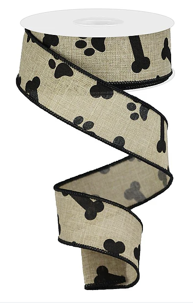 A black and white patterned ribbon with a repeating design of black paw prints and bones.