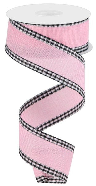 a pink ribbon with black and white checks on it