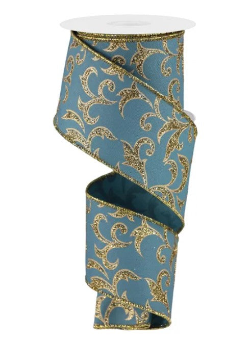 A blue and gold patterned ribbon with a metallic sheen, featuring a repeating floral design.