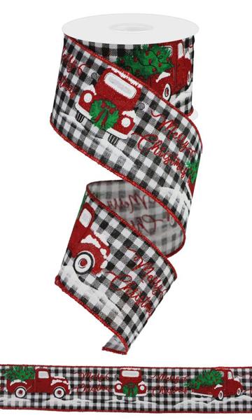a roll of christmas ribbon with a truck on it