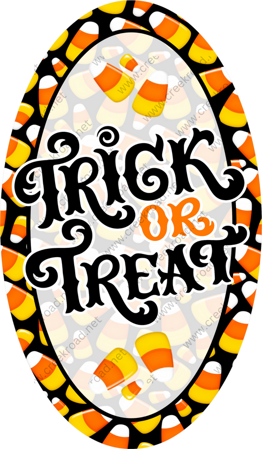 a trick or treat sign with candy corn