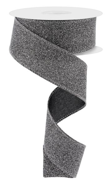 a roll of gray glitter ribbon on a white background