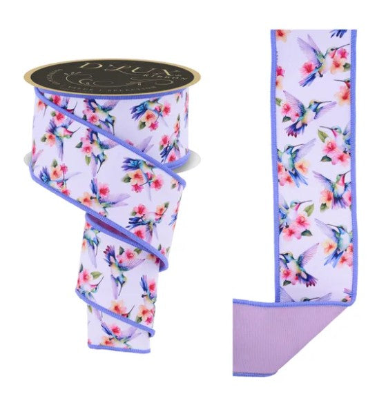 a floral patterned ribbon with a purple border.