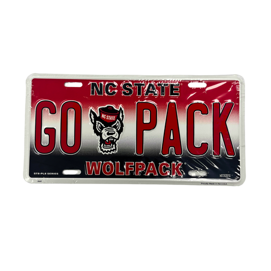 A red and black license plate with the text "NC STATE GO PACK WOLFFPACK" and a graphic of a wolf wearing a hat.