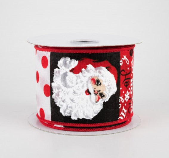 a red and white christmas ribbon with a santa clause on it
