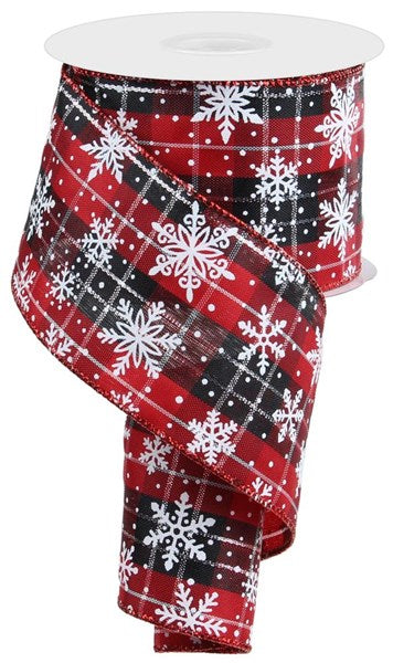 a red and black plaid ribbon with snowflakes on it