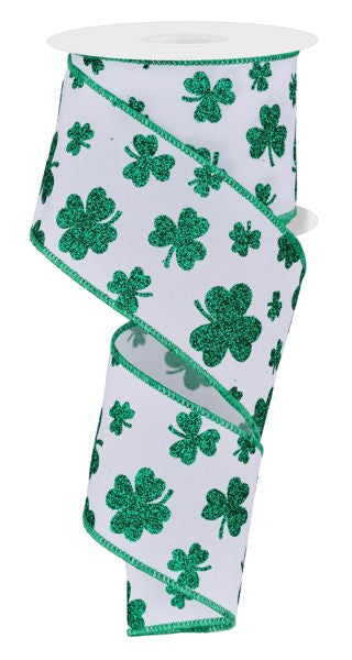 a roll of toilet paper with shamrocks on it