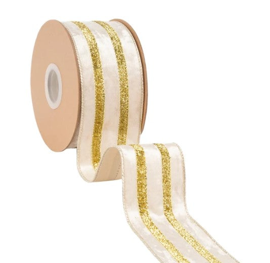 A roll of ribbon with gold glitter and white stripes.