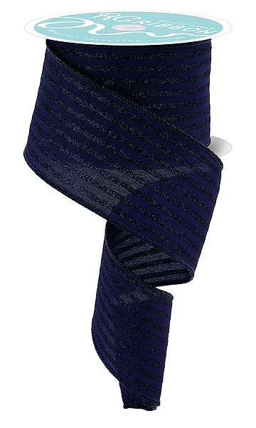 a roll of dark blue ribbon with a white label on top.